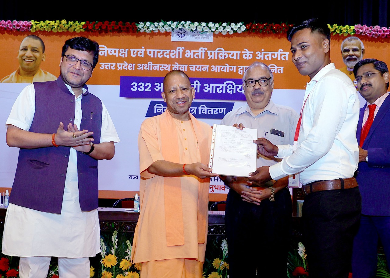 cm yogi during giving joining letter to the candidate